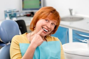 an older woman in the dentist chair